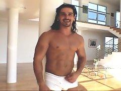 Awesome young guy shows his perfectly shaped body on camera